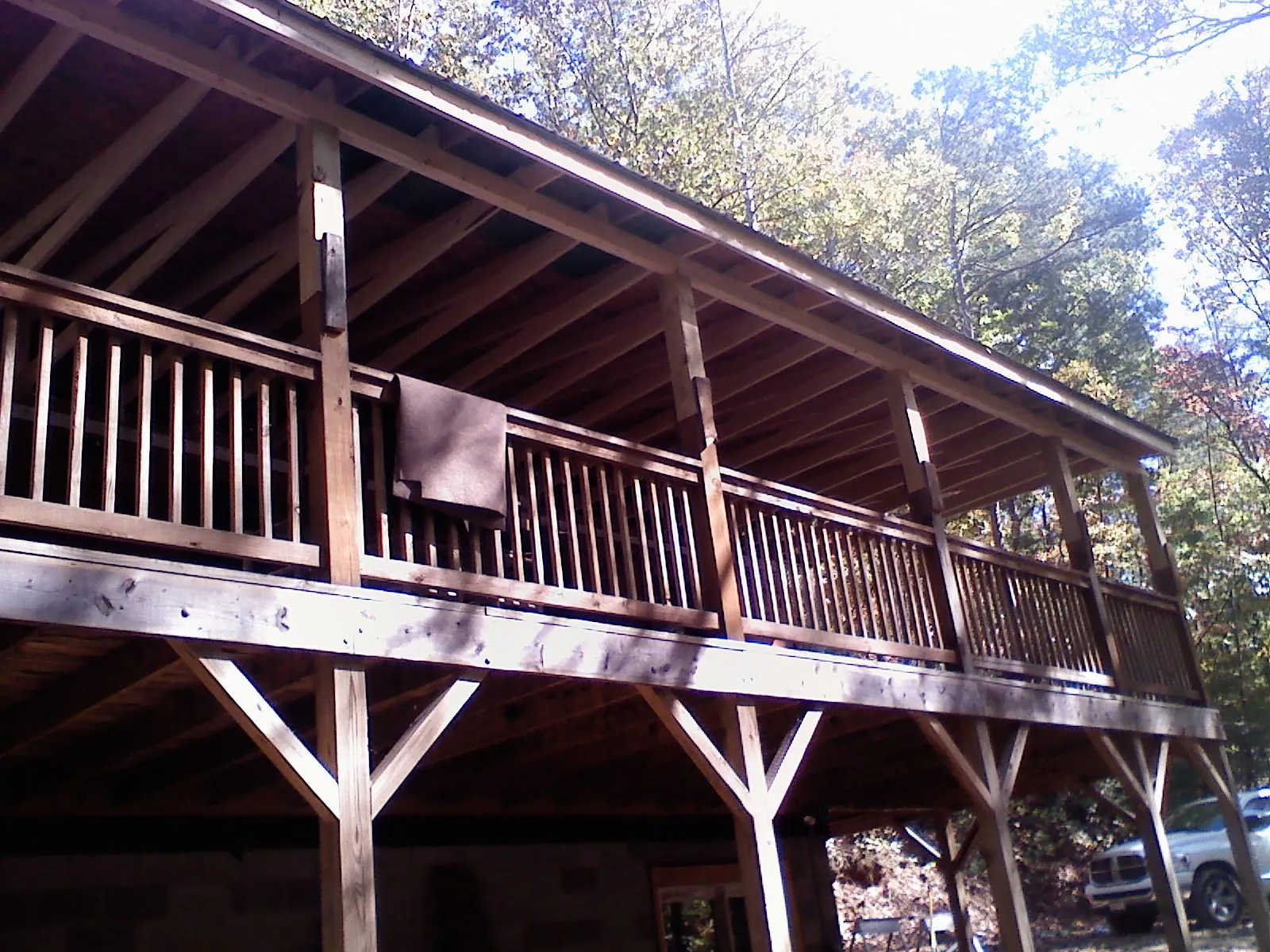Timber framing under a new elevated porch and deck — Roof Leak Repair in Mount Sinai by Roofing Brothers